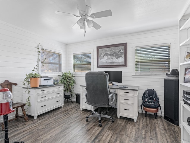 office area featuring dark wood-type flooring, plenty of natural light, and a ceiling fan