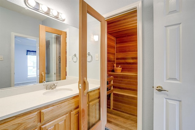 bathroom featuring vanity and a sauna