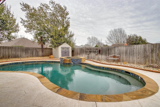 view of swimming pool featuring a patio, an outdoor structure, a fenced backyard, and a shed