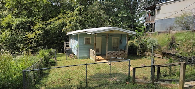 view of outbuilding with a fenced backyard and an outdoor structure