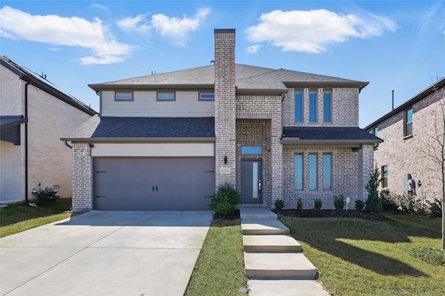 traditional-style home with a front lawn, concrete driveway, an attached garage, brick siding, and a chimney