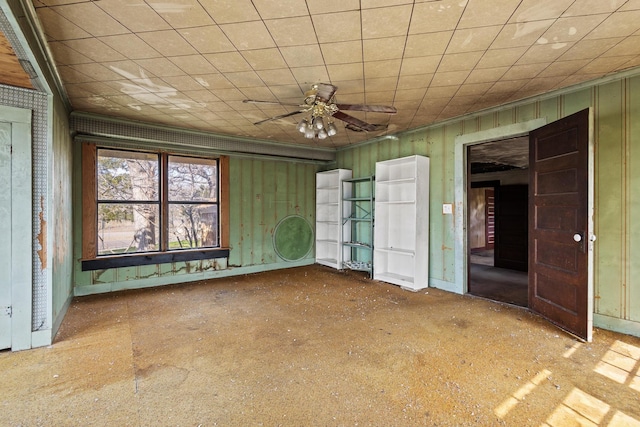 unfurnished room with a ceiling fan