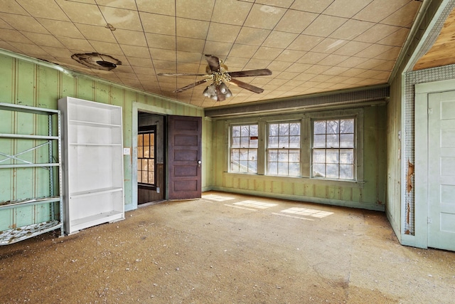 spare room featuring a ceiling fan