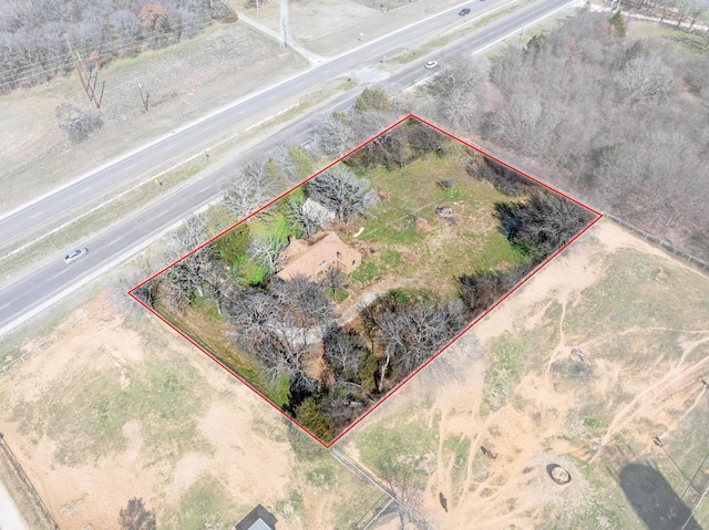 birds eye view of property featuring a rural view