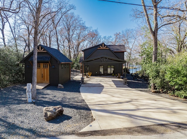 chalet / cabin featuring an outdoor structure