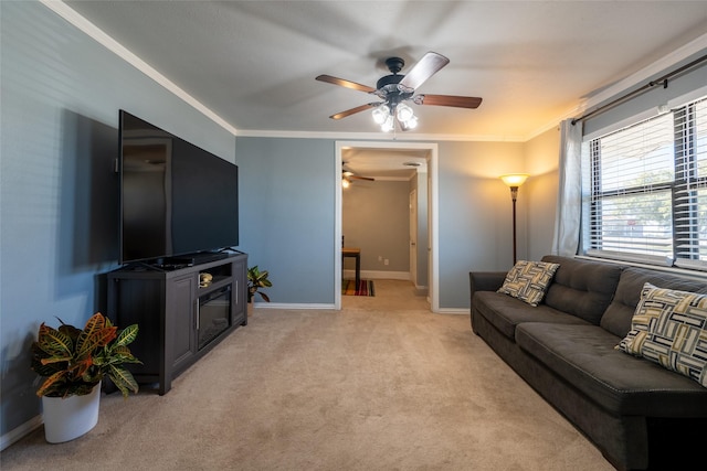 living room featuring light carpet, baseboards, and crown molding