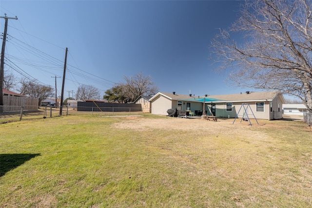 view of yard featuring fence