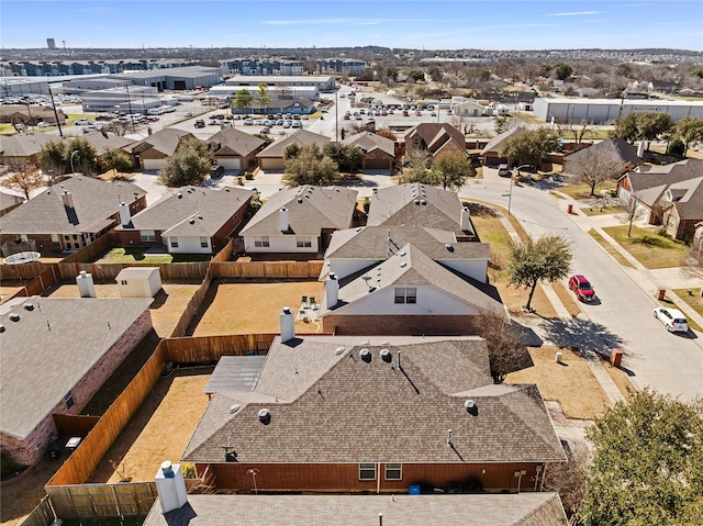 birds eye view of property with a residential view