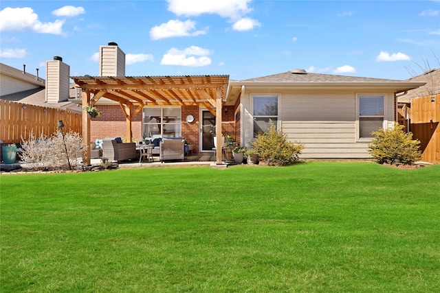 rear view of house with a fenced backyard, a yard, a patio area, outdoor lounge area, and a pergola