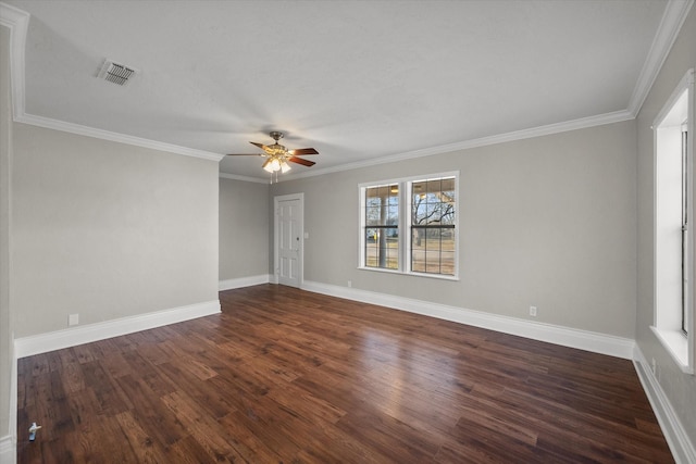 empty room with dark wood-style floors, baseboards, visible vents, and ceiling fan