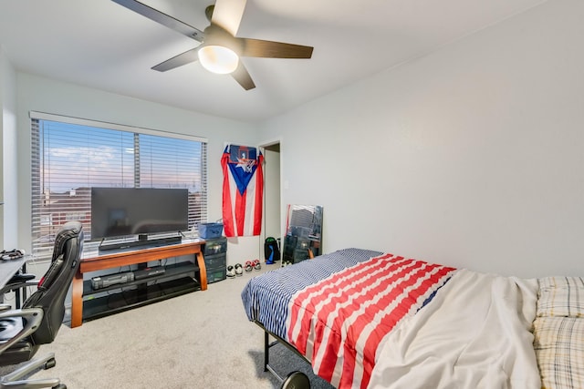 bedroom featuring a ceiling fan and carpet flooring