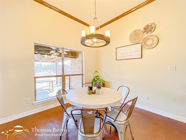 dining room featuring an inviting chandelier and baseboards