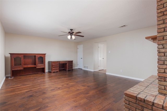 97 Elbert Rd, Van Alstyne, TX 75495 - unfurnished living room featuring visible vents, dark wood finished floors, a ceiling fan, and baseboards
