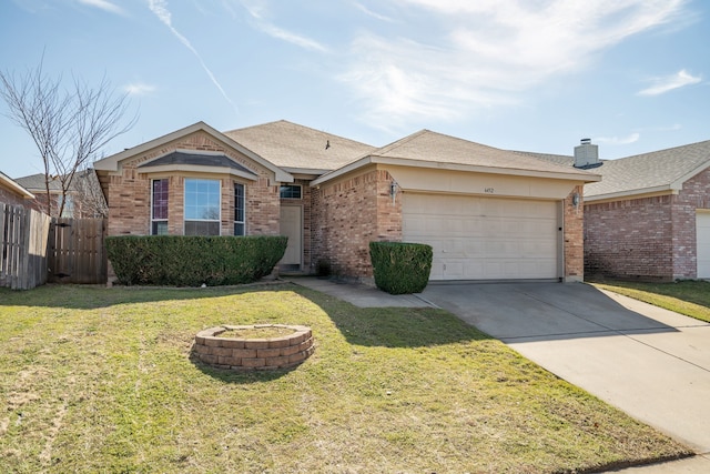 single story home with driveway, a garage, fence, a front yard, and brick siding