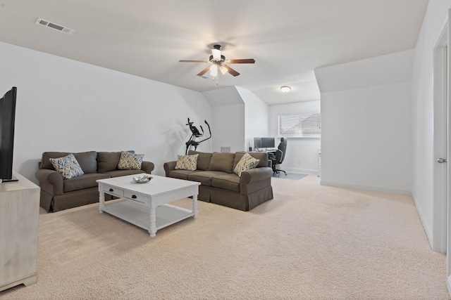 carpeted living area featuring a ceiling fan, lofted ceiling, visible vents, and baseboards