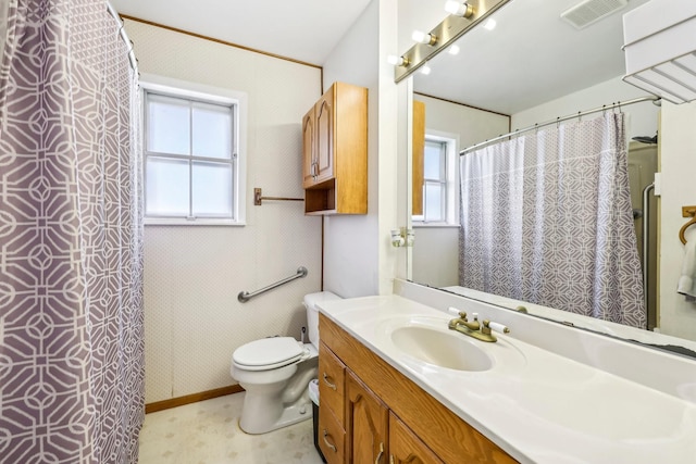 bathroom featuring a shower with curtain, visible vents, vanity, and toilet