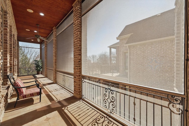 balcony featuring a ceiling fan