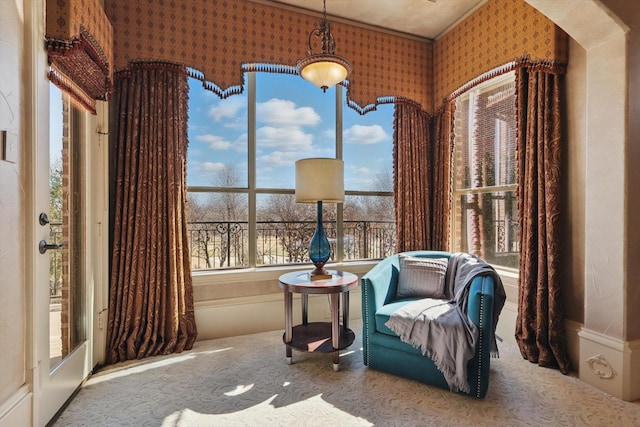 sitting room with carpet floors