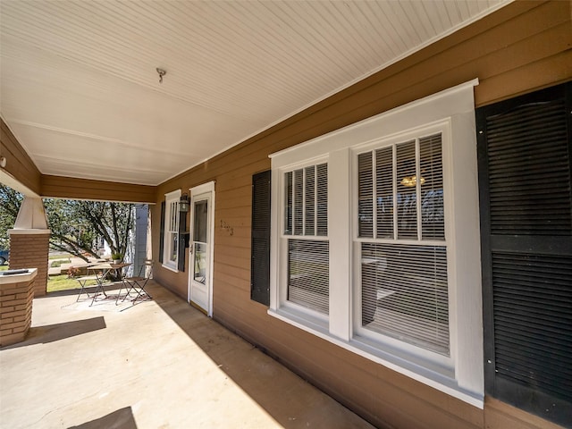 view of patio featuring a porch