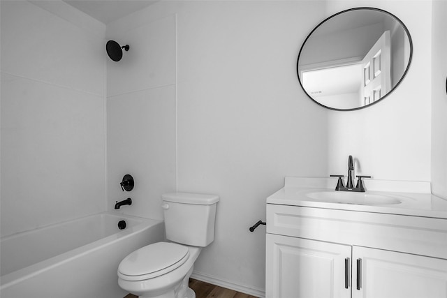 full bathroom featuring shower / tub combination, vanity, and toilet