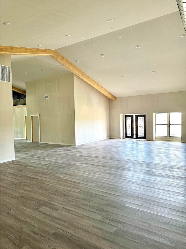 interior space with visible vents and wood finished floors