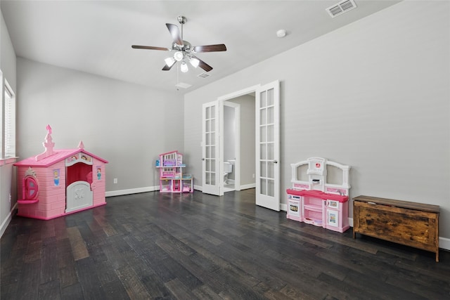 recreation room with visible vents, wood finished floors, french doors, baseboards, and ceiling fan