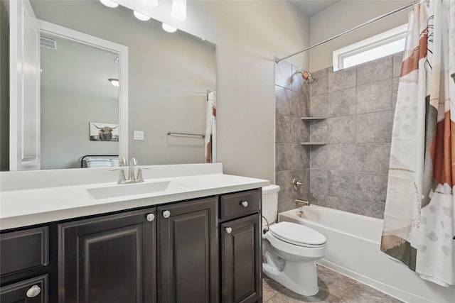 bathroom featuring vanity, shower / bathtub combination with curtain, visible vents, tile patterned floors, and toilet