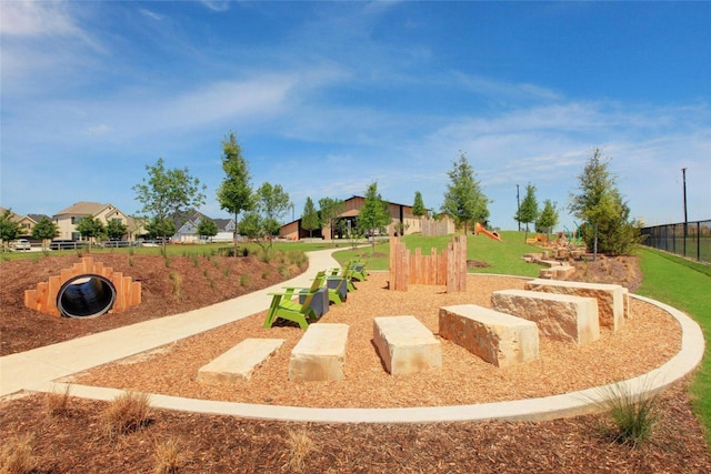 surrounding community featuring fence