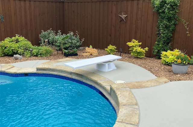 view of pool featuring a fenced backyard and a fenced in pool