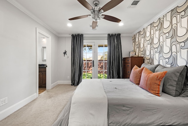 bedroom with access to exterior, crown molding, light colored carpet, visible vents, and baseboards