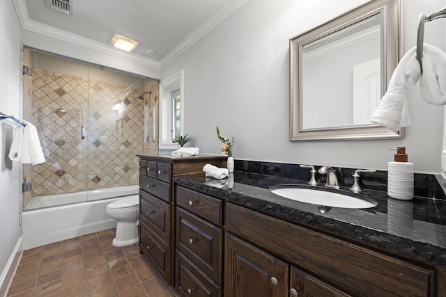 full bath with visible vents, toilet, enclosed tub / shower combo, crown molding, and vanity