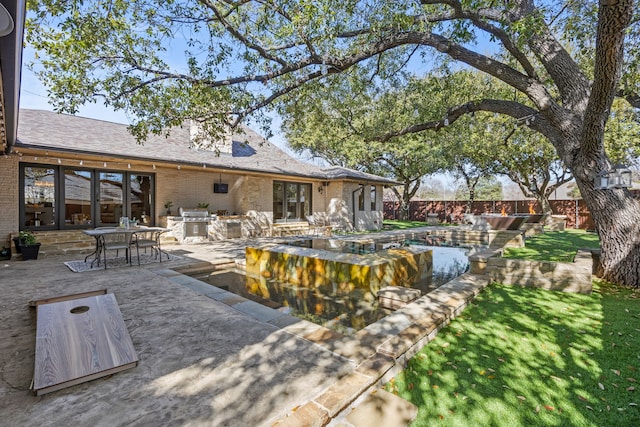 view of pool featuring a patio area, fence, and area for grilling