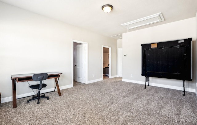 office space featuring carpet, attic access, and baseboards