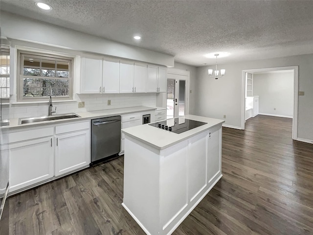 kitchen with black electric stovetop, dark wood-style flooring, a sink, white cabinetry, and stainless steel dishwasher