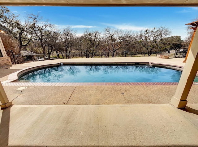 view of pool with a fenced backyard, a fenced in pool, and a patio