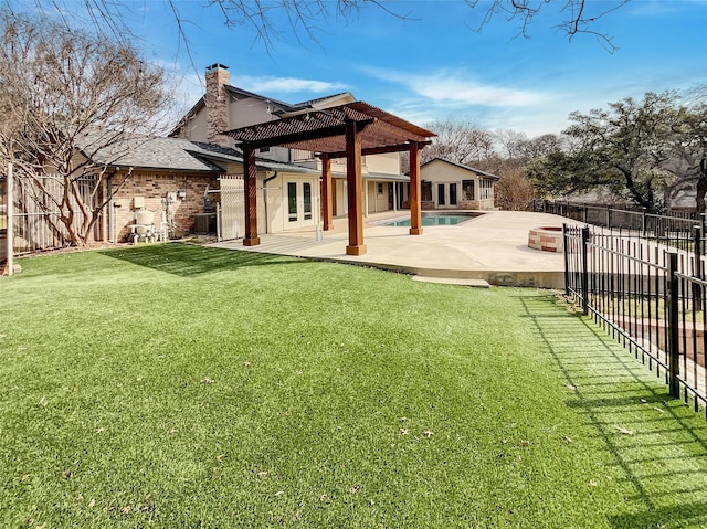 rear view of house featuring a patio, a fenced backyard, a lawn, a pergola, and a chimney