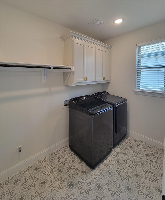 washroom with washer and dryer, baseboards, cabinet space, and recessed lighting