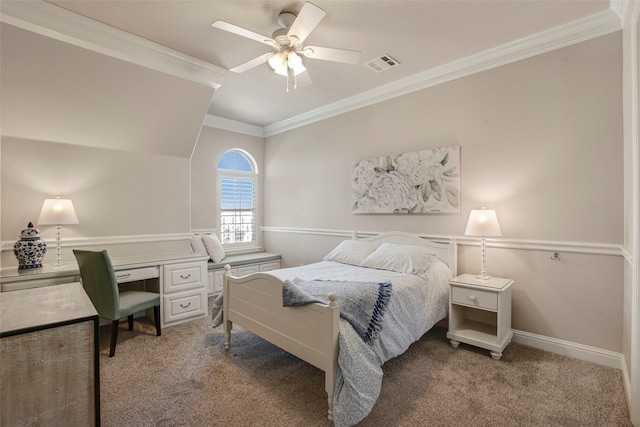 carpeted bedroom featuring crown molding, baseboards, visible vents, and ceiling fan