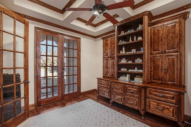 home office with crown molding, baseboards, dark wood finished floors, french doors, and a ceiling fan