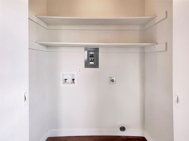 clothes washing area featuring laundry area, hookup for a washing machine, baseboards, and hookup for an electric dryer