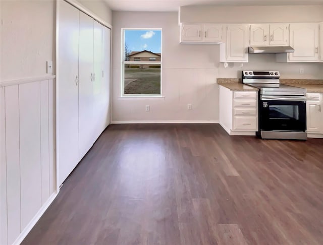 kitchen with white cabinetry, under cabinet range hood, electric range, and dark wood-style floors