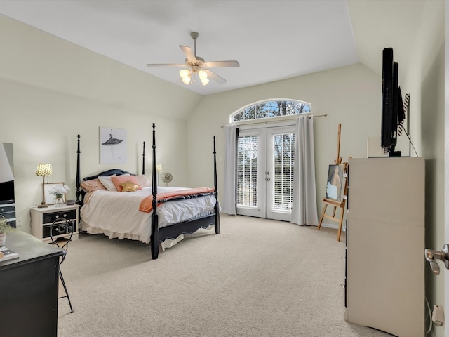 bedroom with access to exterior, carpet flooring, french doors, and vaulted ceiling