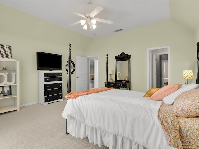 carpeted bedroom with visible vents, baseboards, a ceiling fan, and vaulted ceiling