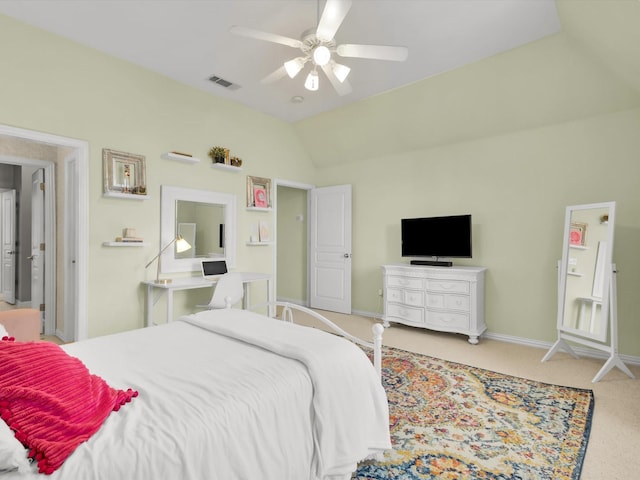 bedroom with visible vents, baseboards, lofted ceiling, carpet flooring, and a ceiling fan