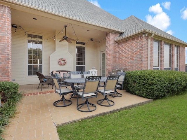 view of patio featuring outdoor dining space and ceiling fan