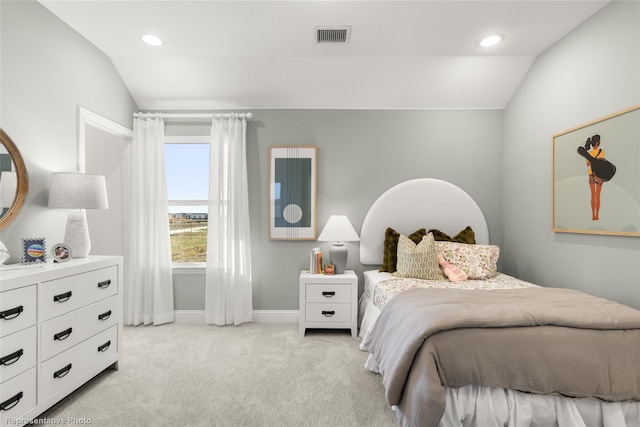 bedroom with baseboards, visible vents, light colored carpet, vaulted ceiling, and recessed lighting