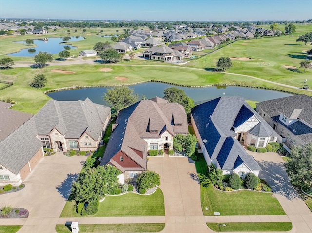 bird's eye view with view of golf course, a water view, and a residential view