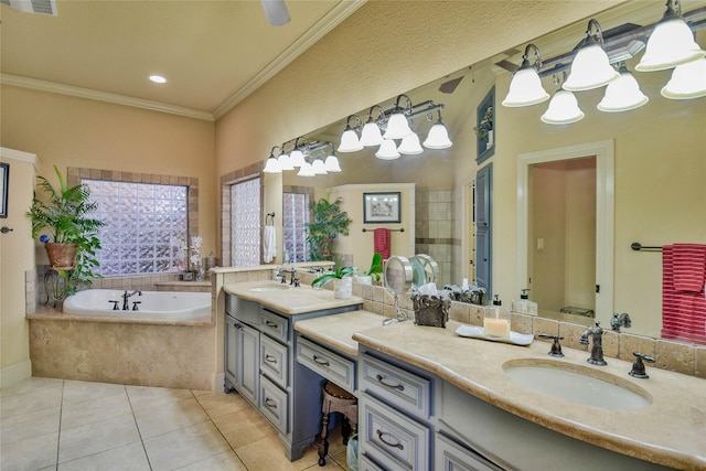 full bathroom featuring a garden tub, tile patterned flooring, visible vents, vanity, and ornamental molding