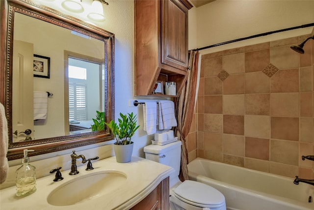 full bathroom featuring toilet, shower / tub combo, and vanity