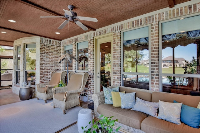 view of patio with outdoor lounge area and a ceiling fan